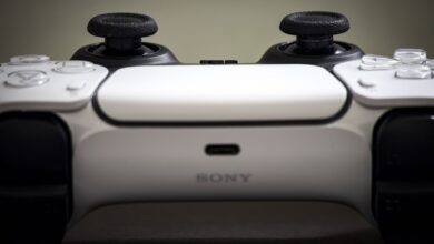 Detailed view of a Sony PlayStation 5 DualSense controller, highlighting design and features.