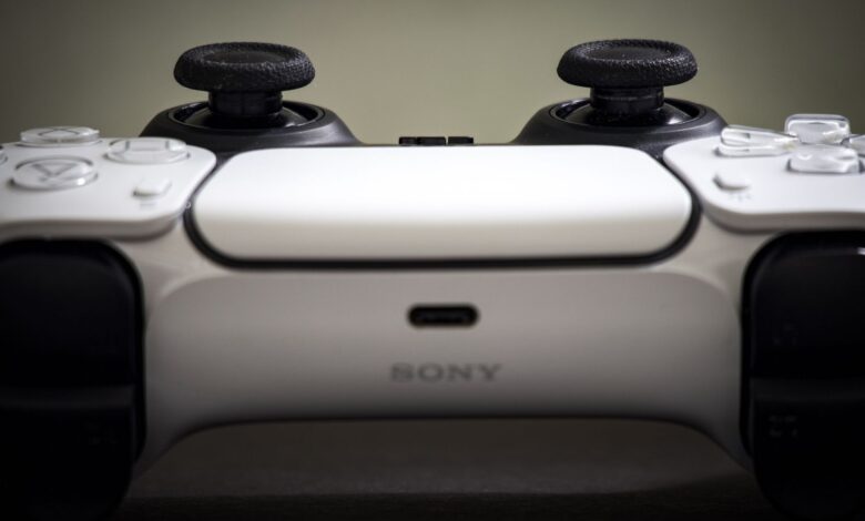 Detailed view of a Sony PlayStation 5 DualSense controller, highlighting design and features.