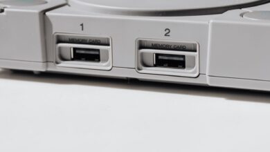 Detailed view of vintage PlayStation console featuring memory slots, capturing nostalgia.