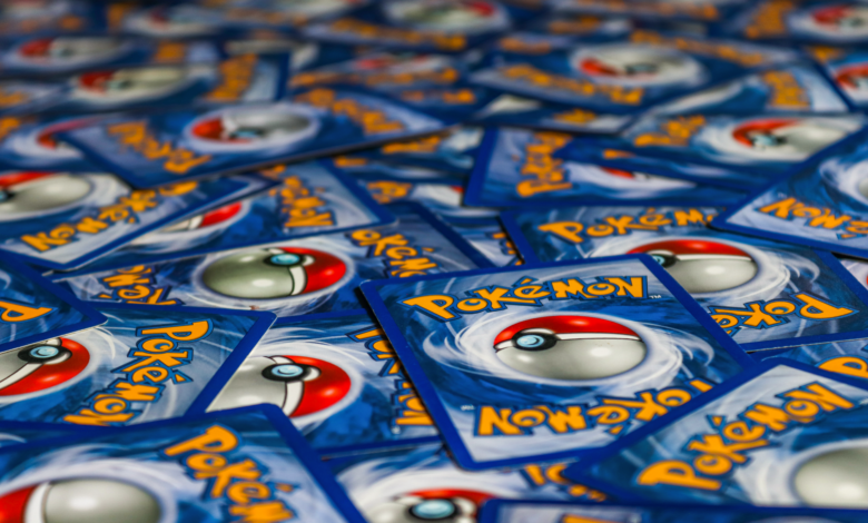 A vibrant display of Pokémon trading cards featuring the iconic Pokeball design.