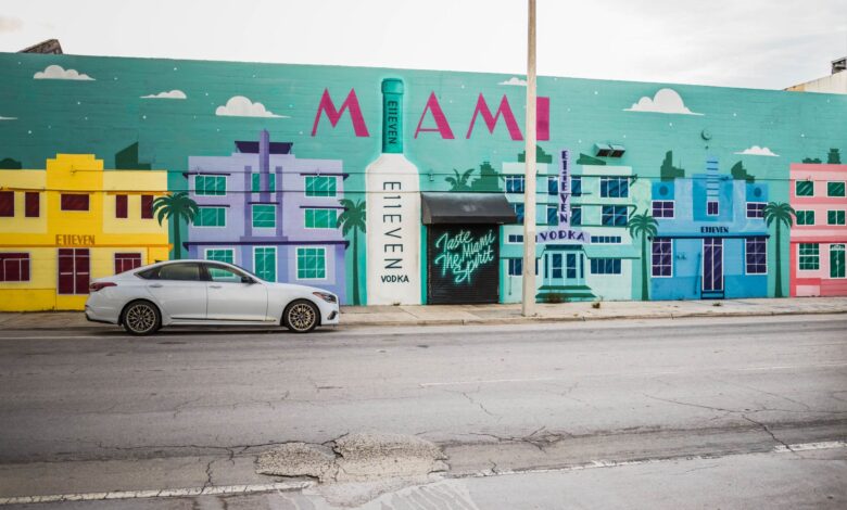 Colorful Miami mural featuring E11even Vodka in vibrant street art style.