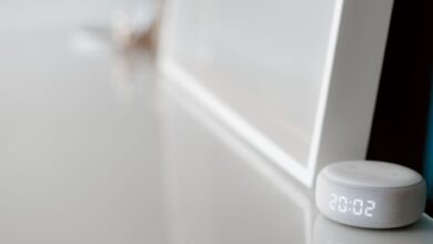 Modern minimalist design featuring an electronic device on a sleek desk.