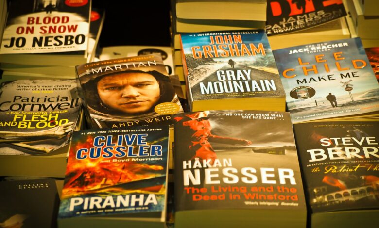 A collection of bestselling thriller novels prominently displayed in a bookstore setting.
