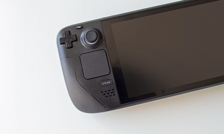 High-resolution image of a handheld gaming console on a white background.