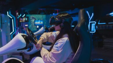 Young woman immersed in a virtual reality racing game in a futuristic setting.