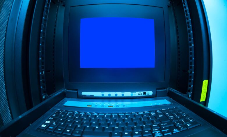 Close-up of a blue screen error shown on a data center control terminal.