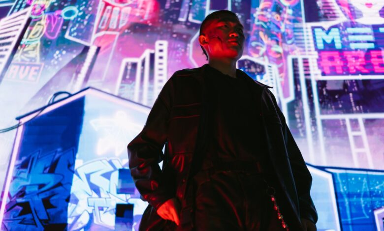 A man in a futuristic cyberpunk city with vibrant neon signs and lights.
