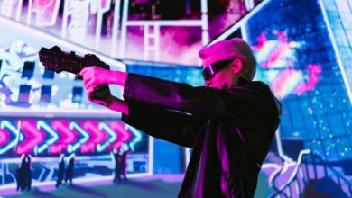 Person in cyberpunk attire aims futuristic gun in neon-lit scene