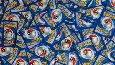 A vibrant collection of Pokemon trading cards featuring iconic Pokeball design and Pokemon logo.