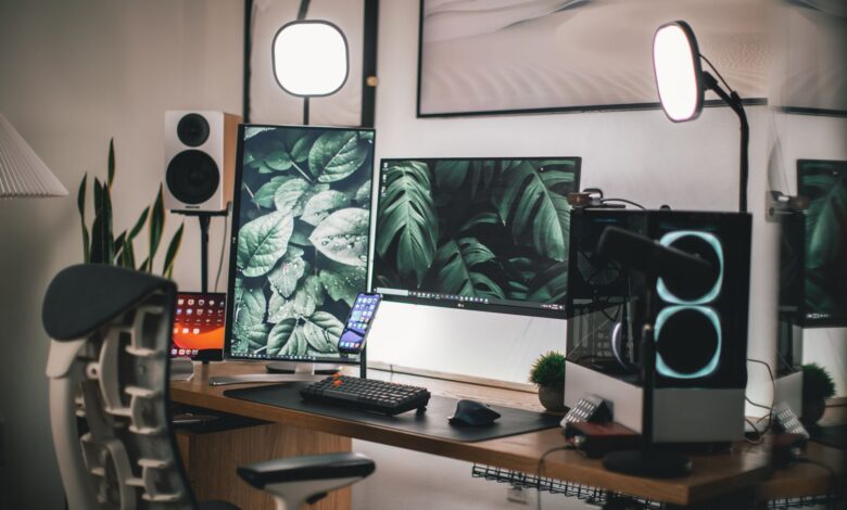 Stylish gaming and streaming setup with dual monitors, PC, and accessories.