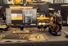 Modern gaming gear setup on display at a tech expo.