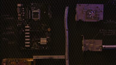 A close-up view of a motherboard and electronic components against a detailed chalkboard backdrop.