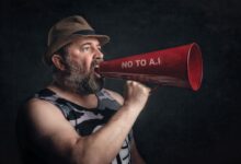 Bearded man shouting through a red megaphone with 'No to A.I' message.