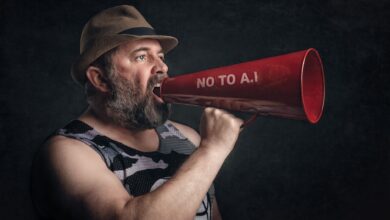 Bearded man shouting through a red megaphone with 'No to A.I' message.