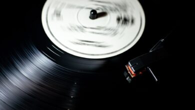 Close-up of a vintage vinyl record spinning on a turntable.