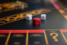 High-quality close-up photo of dice on a classic Monopoly board game, highlighting the gaming experience.