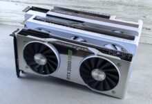 Three NVIDIA GeForce RTX graphics cards stacked on a surface, showcasing their sleek design and branding details.