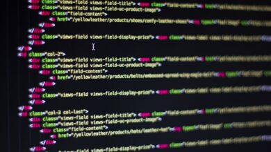 Detailed close-up of HTML code on a computer monitor, showcasing web development.
