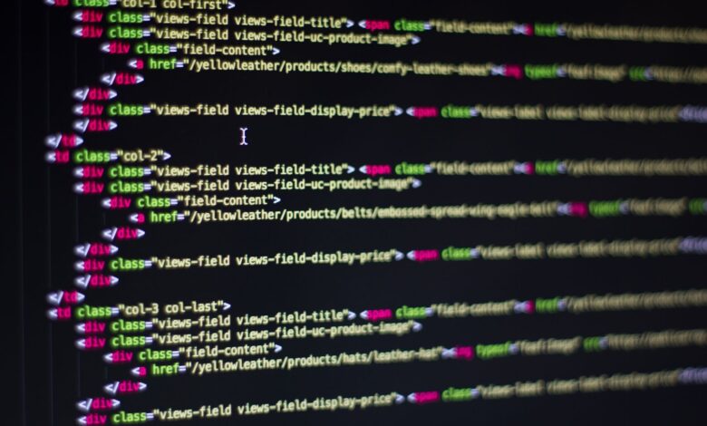 Detailed close-up of HTML code on a computer monitor, showcasing web development.