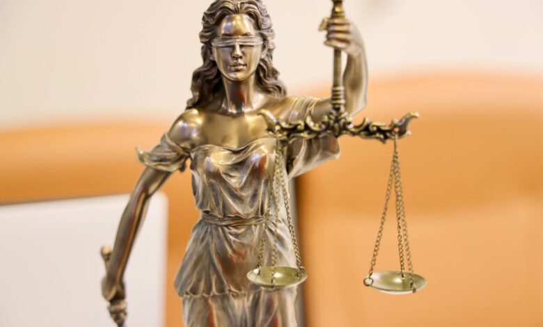 Detailed image of Lady Justice statue, symbolizing fairness and impartiality.