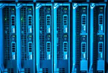 Detailed image of illuminated server racks showcasing modern technology infrastructure.