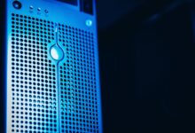 Modern server rack with blue lighting in a secure data center environment.