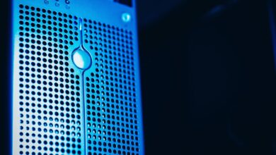 Modern server rack with blue lighting in a secure data center environment.
