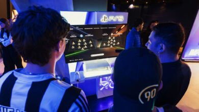 Group of gamers engaged in a PS5 event, choosing teams on a football game selection screen.