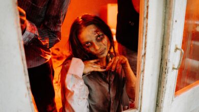 A haunting zombie emerges in a dimly lit room, evoking spine-chilling horror vibes.