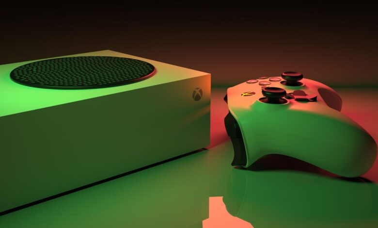 Close-up of an Xbox Series console and controller with dynamic lighting, showcasing modern gaming technology.