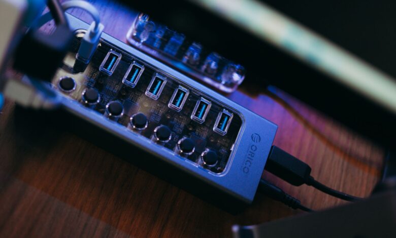Close-up of a multi-port USB hub, showcasing modern technology connection setup.