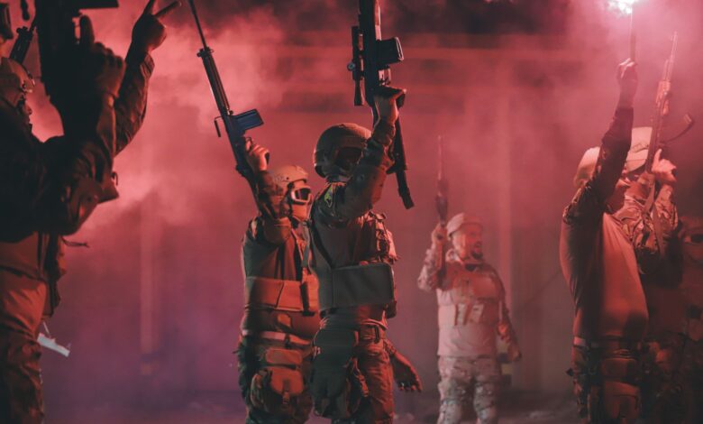 Libyan soldiers holding rifles and red flares in a dynamic military scene.