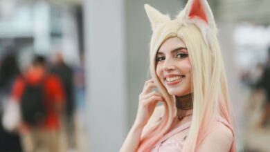 A cosplayer dressed in fox ears and blonde wig at an anime convention in San José, Costa Rica.