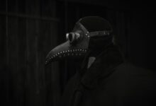 A haunting still life of a plague doctor mask in dark lighting, evoking historical and gothic themes.