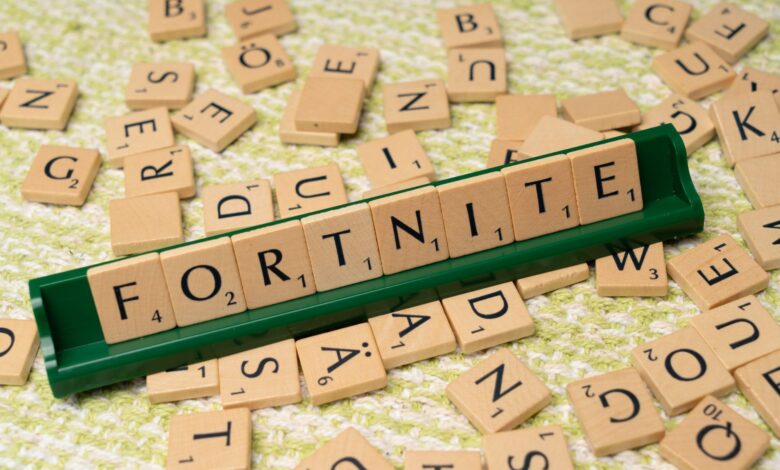 Scrabble tiles forming the word Fortnite, symbolizing gaming creativity and fan art.