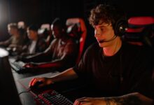 A dedicated team of young gamers engaging in a competitive esports tournament.