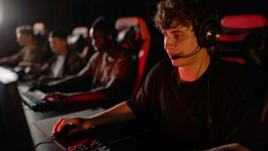 A dedicated team of young gamers engaging in a competitive esports tournament.