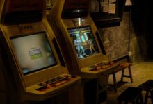 Explore retro arcade machines in a dimly lit gaming area in Changsha, China, capturing nostalgic vibes.