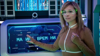A woman interacts with a futuristic touchscreen display in a technology-themed environment.