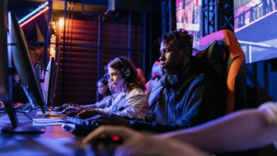 Serious gamers engage in a competitive esports event, highlighting focus and teamwork.