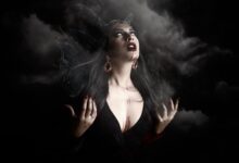 Eerie portrayal of a vampire woman with dramatic lighting and smoke.