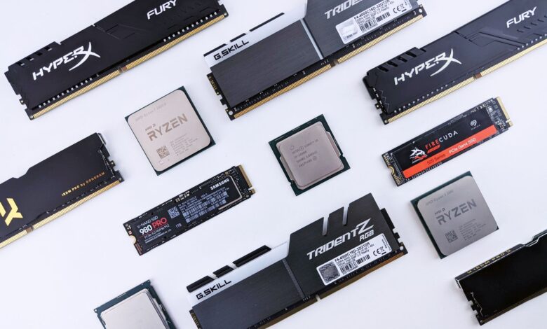 High-quality image of various computer components, including RAM and CPUs, on a white background.