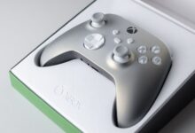A high-quality close-up of an Xbox game controller in its packaging box, ready for gaming.