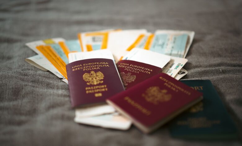 Close-up of Polish passports and travel tickets symbolizing travel and adventure.