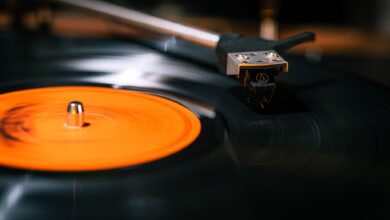 Elegant close-up of a rotating vinyl record on a turntable, focusing on the needle.