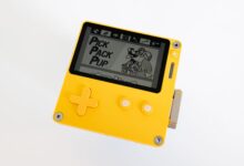 Vibrant yellow handheld console displaying a retro game screen. Perfect for gaming enthusiasts.