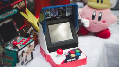 A collection of vintage arcade consoles and toys set in Tunis, Tunisia, evoking nostalgia.
