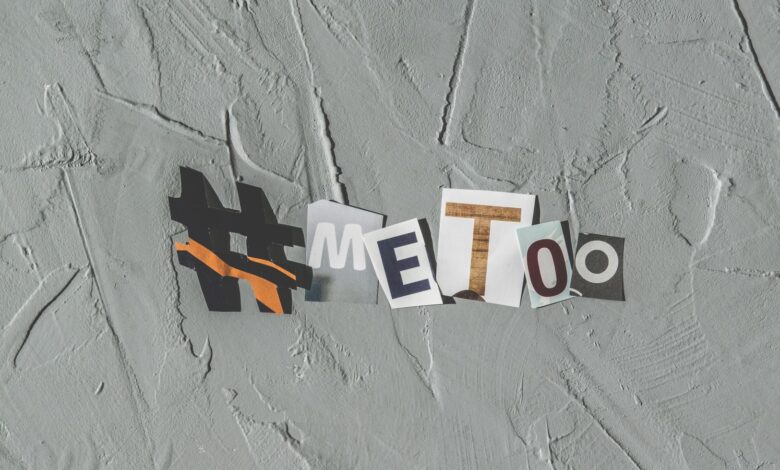 Text art 'MeToo' on concrete background highlighting social movement themes.