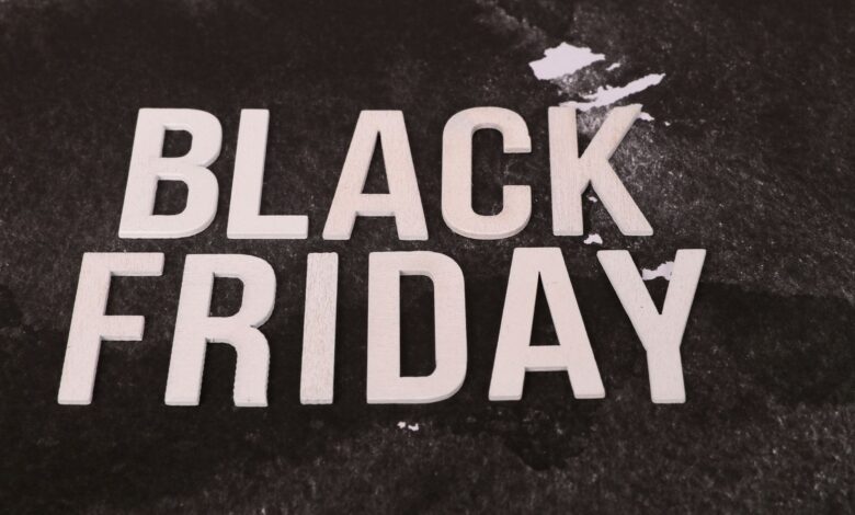 Bold 'Black Friday' text on a textured dark background, ideal for promotions.