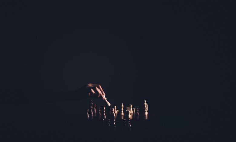 Dark atmospheric chess game showcasing strategic play, emphasizing intelligence and strategy.